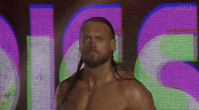 Long Haired Bearded Man In Front Of Fits Screen GIF