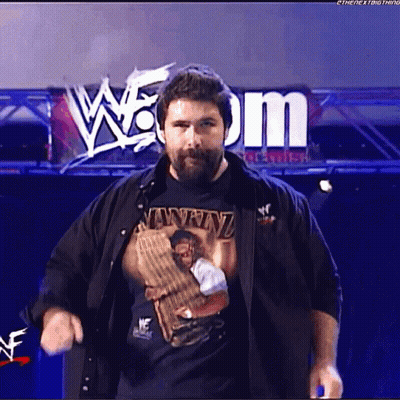 Long Haired Bearded Man Talking Into TCW Microphone GIF