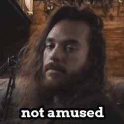 Long Haired Guy Not Amused GIF