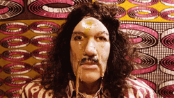 Long-Haired Man Face Melt GIF