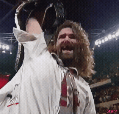 Long-Haired Man Holding Wrestling Belt GIF