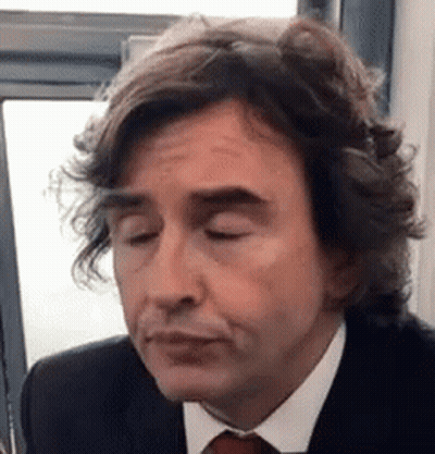 Long-Haired Man In Suit And Tie Funny Face GIF
