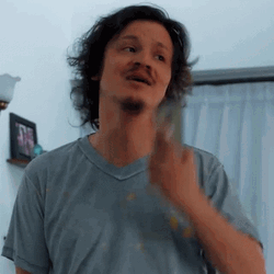 Long Haired Man Sigh Of Relief GIF