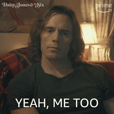 Long-Haired Man Sitting On Couch Saying Yeah Me Too GIF