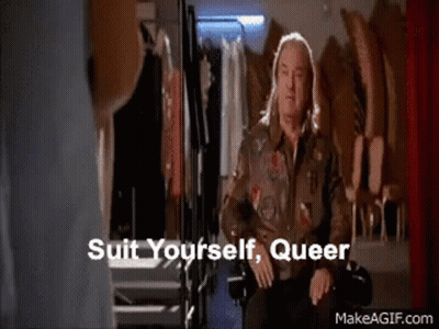 Long-Haired Man Talking To Woman In Dressing Room GIF