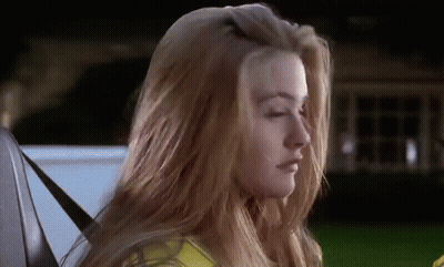 Long-Haired Woman Sitting In Back Of Car GIF
