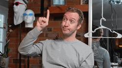 Look Pointing Up Puckered Face GIF