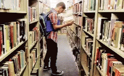 Looking For Books In The Library GIF