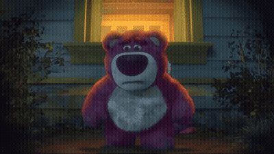 Lotso From Toy Story Is Standing In Front Of A House Looking Out The Window . GIF