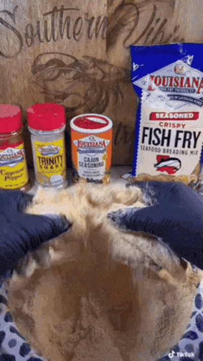 Louisiana Seasoned Crispy Fish Fry Pouring Into Bowl GIF