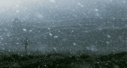 Low Visibility Snow Storm In Mountain Ranges GIF