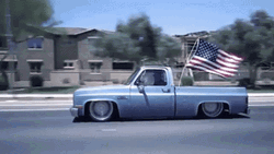 Lowrider Car With American Flag GIF