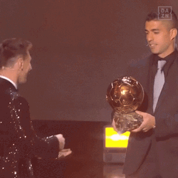 Luis Suarez Give Trophy With Hug To Lionel Messi GIF