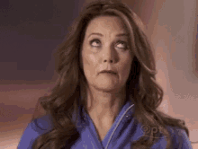 Lynda Carter Making Face Gun To Head GIF