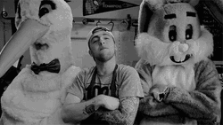 Mac Miller Nod With Two Mascots GIF