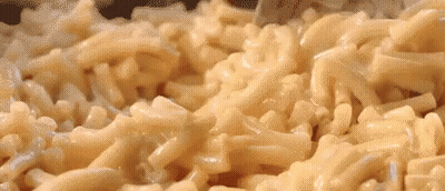 Macaroni And Cheese In A Pan With Fork GIF