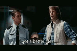 Macgruber Whispering To A Security GIF