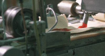 Machine With Label Saying A GIF