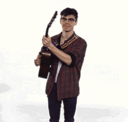 Mackenzie Pointing Guitar GIF