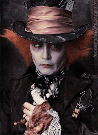Mad Hatter Holding Glove GIF
