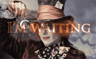 Mad Hatter Holding Pocket Watch Saying I'm Waiting GIF