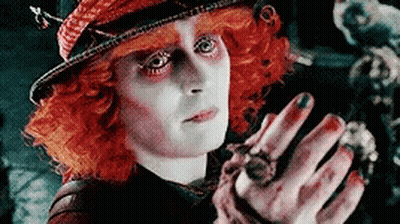 Mad Hatter Holding Spider GIF