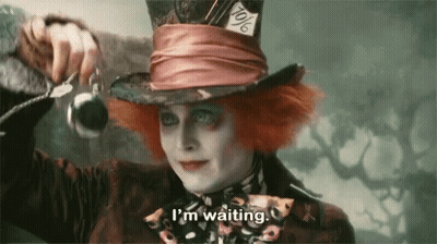 Mad Hatter Holding Watch Saying I'm Waiting GIF