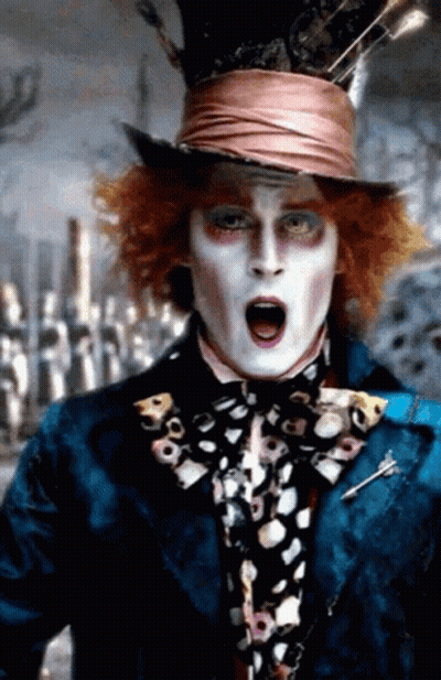 Mad Hatter In Blue Jacket And Top Hat GIF