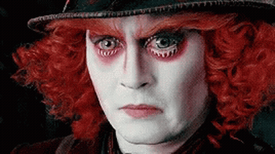 Mad Hatter In Hat And Red Wig GIF
