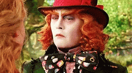 Mad Hatter In Red Top Hat And Bow Tie GIF