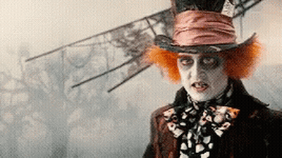 Mad Hatter In Top Hat And Scarf GIF