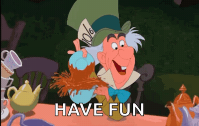 Mad Hatter Smiling Holding Teapot Saying Have Fun GIF