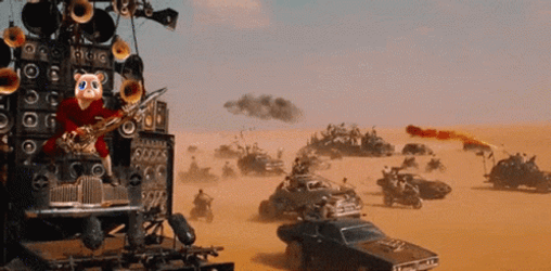 Mad Max Fury Road Doof Warrior With Teddy's Head Playing His Guitar GIF