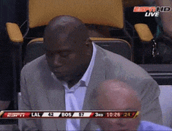 Magic Johnson Shoving Popcorn In Mouth Meme GIF