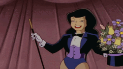 Magician Zatanna Doing Flower To Bubbles Trick GIF