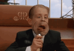 Magnifying Glass Home Alone McCaulley Tongue Out GIF