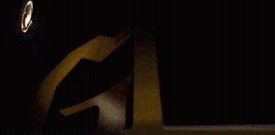 Magnifying Glass Looking At Gold Trophy