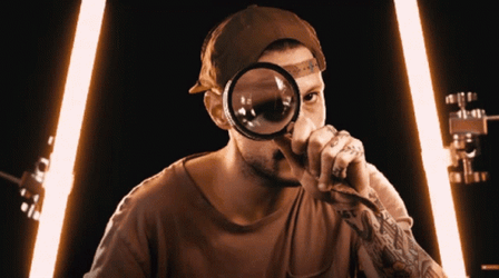 Magnifying Glass Tattooed Curious Guy Inspecting  GIF