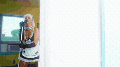 Maid Singing Into Microphone GIF