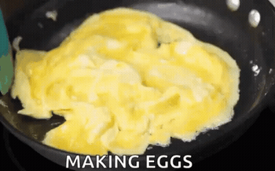 Making Eggs In Frying Pan GIF