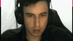 Male Streamer Closing Eyes After Flashbang GIF