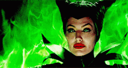 Maleficent Burning Stare Green Flames Background GIF