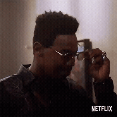Man Adjusting Glasses GIF