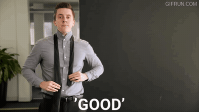 Man Adjusting Tie Saying Good GIF