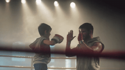 Man And Boy Boxing In Ring GIF