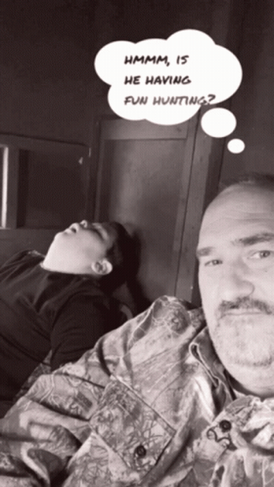 Man And Boy Laying Down With Thought Bubble Hmm Is He Having Fun Hunting GIF