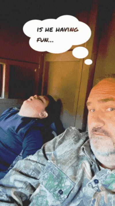 Man And Boy Laying Down With Thought Bubble Saying Is He Having Fun GIF