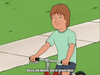 Man and Boy on Bike with Dusty Bones