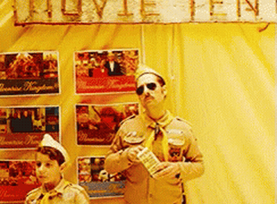 Man And Boy Scout By Movie Tent Sign GIF