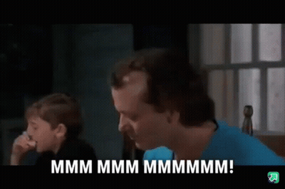 Man And Boy Sitting At Table Talking GIF